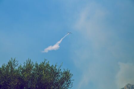 Moni Osiou Patapiou, Greek Republic. Air force fills with water to extinguish the fire. 14. Sep....