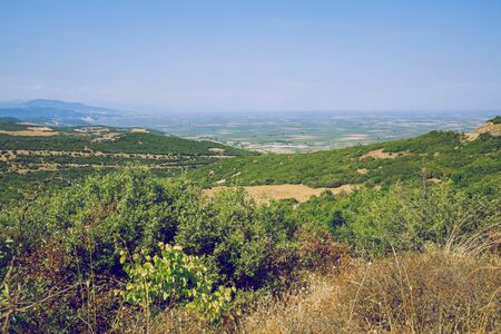 Greek Republic. Fields and mountains, grass and trees. In the distance mountains and sky. 13. Sep. 2019.の写真素材