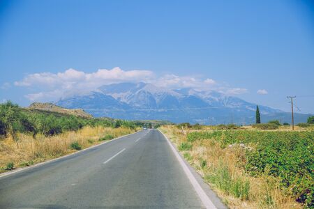 Greek Republic. Way and mountains, grass and trees. 13. Sep. 2019