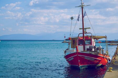City Athens, Greek Republic. Fishing ship standing at berth, sunny weather. 13. Sep. 2019.のeditorial素材