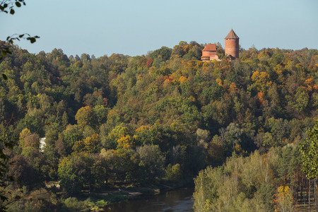 City Sigulda, Latvia Republic. Old castle, build from red bricks. Around trees with yellow leafs. 27. Sep. 2019のeditorial素材