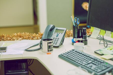 City Riga, Latvia. Standing on the desk is a cisco ip phone and stationery. 2.12.2019.のeditorial素材