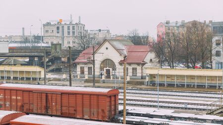 City Riga, Latvia. Railway station in the fog with wagons and rails. Visible snow. 16.01.2020のeditorial素材