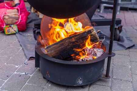 City Riga, Latvia. Street Restaurant food festival. On the fire is being prepared to eat.18.01.2020の写真素材