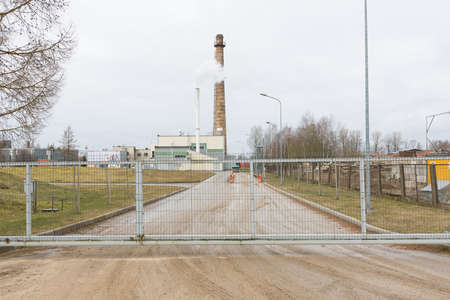 City Cesis, Latvia. City heating company, buildings and chimney.02.03.2020