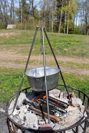 City Tuja, Latvia. Food is prepared outside. Fireplace and kettle.09.05.2020の写真素材
