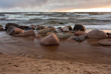 City Tuja, Latvia. Baltic sea with rocks and sand. Travel photo.16.05.2020の写真素材