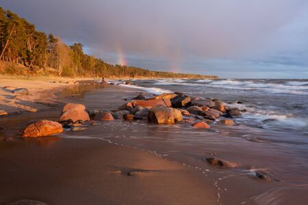 City Tuja, Latvia. Baltic sea with rocks and sand. Travel photo.16.05.2020の写真素材