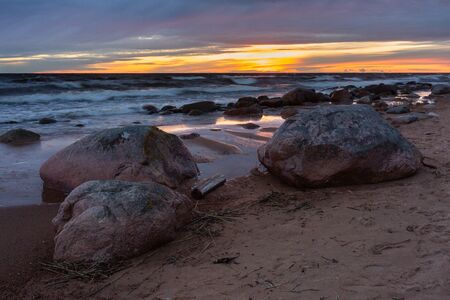 City Tuja, Latvia. Baltic sea with rocks and sand. Travel photo.16.05.2020の写真素材