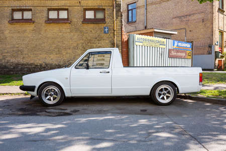 City Cesis, Latvia. Old retro white volkswagen pickup on the street.29.05.2020のeditorial素材