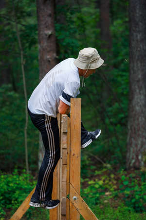 City Riga, Latvia. Run race, people were engaged in sports activities. Overcoming various obstacles and running.  5.07.2020のeditorial素材
