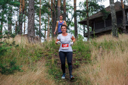 City Riga, Latvia. Run race, people were engaged in sports activities. Overcoming various obstacles and running.  5.07.2020のeditorial素材