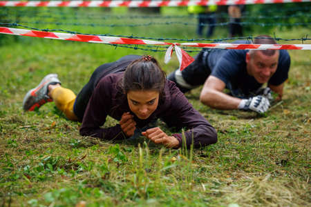 City Riga, Latvia. Run race, people were engaged in sports activities. Overcoming various obstacles and running.  5.07.2020のeditorial素材