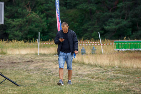 City Riga, Latvia. Run race, people were engaged in sports activities. Overcoming various obstacles and running.  5.07.2020のeditorial素材