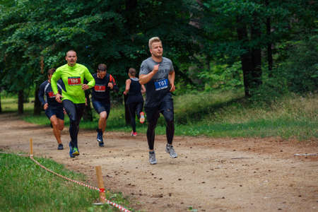 City Riga, Latvia. Run race, people were engaged in sports activities. Overcoming various obstacles and running.  5.07.2020のeditorial素材