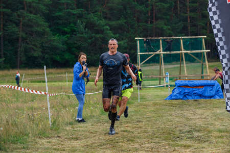 City Riga, Latvia. Run race, people were engaged in sports activities. Overcoming various obstacles and running.  5.07.2020のeditorial素材