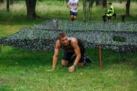City Riga, Latvia. Run race, people were engaged in sports activities. Overcoming various obstacles and running.  5.07.2020のeditorial素材