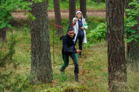 City Riga, Latvia. Run race, people were engaged in sports activities. Overcoming various obstacles and running.  5.07.2020のeditorial素材
