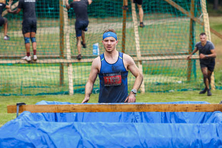 City Riga, Latvia. Run race, people were engaged in sports activities. Overcoming various obstacles and running.  5.07.2020のeditorial素材