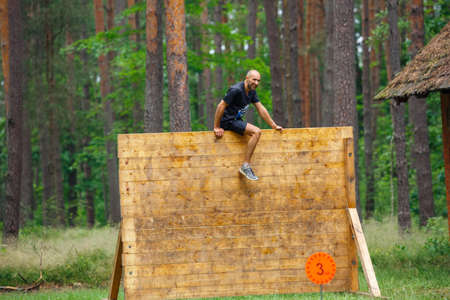City Riga, Latvia. Run race, people were engaged in sports activities. Overcoming various obstacles and running.  5.07.2020のeditorial素材