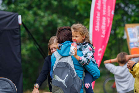 City Riga, Latvia. Run race, people were engaged in sports activities. Overcoming various obstacles and running.  5.07.2020のeditorial素材