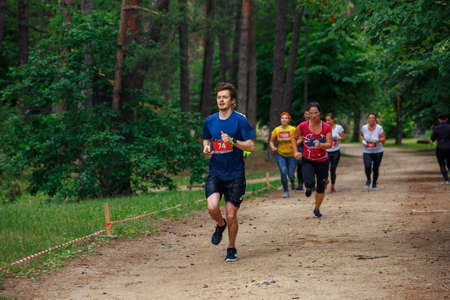 City Riga, Latvia. Run race, people were engaged in sports activities. Overcoming various obstacles and running.  5.07.2020のeditorial素材