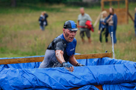 City Riga, Latvia. Run race, people were engaged in sports activities. Overcoming various obstacles and running.  5.07.2020のeditorial素材
