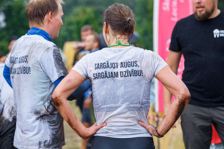 City Riga, Latvia. Run race, people were engaged in sports activities. Overcoming various obstacles and running.  5.07.2020のeditorial素材