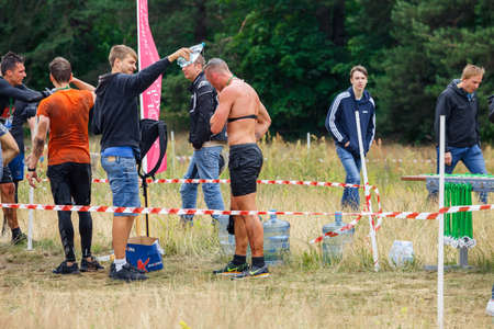 City Riga, Latvia. Run race, people were engaged in sports activities. Overcoming various obstacles and running.  5.07.2020のeditorial素材