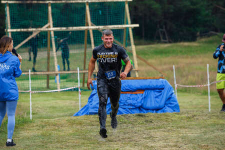 City Riga, Latvia. Run race, people were engaged in sports activities. Overcoming various obstacles and running.  5.07.2020のeditorial素材