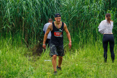 City Riga, Latvia. Run race, people were engaged in sports activities. Overcoming various obstacles and running.  5.07.2020のeditorial素材