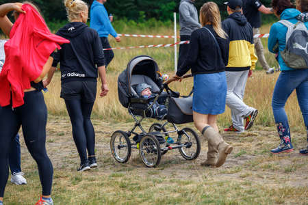 City Riga, Latvia. Run race, people were engaged in sports activities. Overcoming various obstacles and running.  5.07.2020のeditorial素材