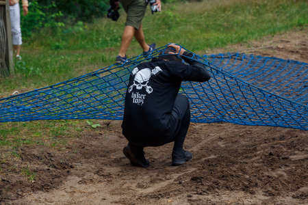 City Riga, Latvia. Run race, people were engaged in sports activities. Overcoming various obstacles and running.  5.07.2020のeditorial素材