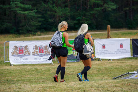 City Riga, Latvia. Run race, people were engaged in sports activities. Overcoming various obstacles and running.  5.07.2020のeditorial素材