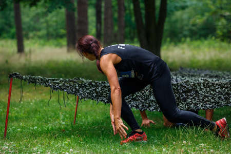 City Riga, Latvia. Run race, people were engaged in sports activities. Overcoming various obstacles and running.  5.07.2020のeditorial素材