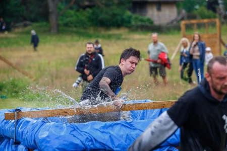 City Riga, Latvia. Run race, people were engaged in sports activities. Overcoming various obstacles and running.  5.07.2020のeditorial素材