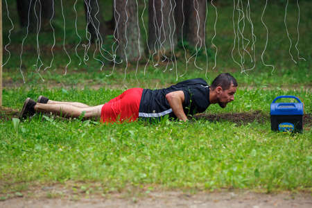 City Riga, Latvia. Run race, people were engaged in sports activities. Overcoming various obstacles and running.  5.07.2020のeditorial素材