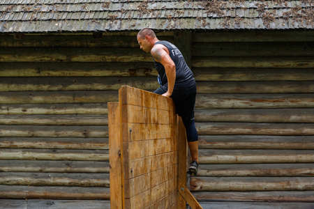 City Riga, Latvia. Run race, people were engaged in sports activities. Overcoming various obstacles and running.  5.07.2020のeditorial素材