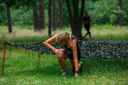 City Riga, Latvia. Run race, people were engaged in sports activities. Overcoming various obstacles and running.  5.07.2020のeditorial素材