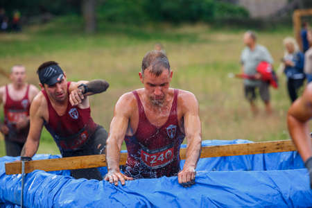 City Riga, Latvia. Run race, people were engaged in sports activities. Overcoming various obstacles...
