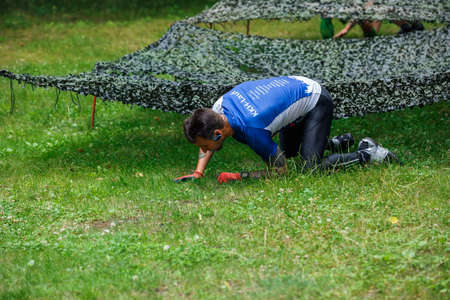 City Riga, Latvia. Run race, people were engaged in sports activities. Overcoming various obstacles and running.  5.07.2020のeditorial素材
