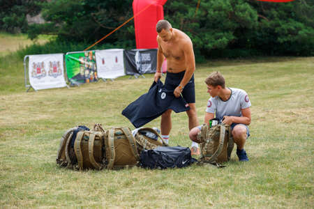 City Riga, Latvia. Run race, people were engaged in sports activities. Overcoming various obstacles and running.  5.07.2020のeditorial素材