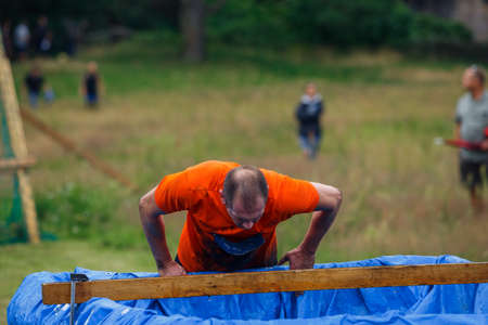 City Riga, Latvia. Run race, people were engaged in sports activities. Overcoming various obstacles and running.  5.07.2020のeditorial素材