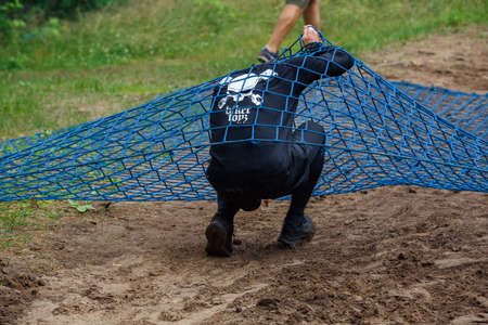 City Riga, Latvia. Run race, people were engaged in sports activities. Overcoming various obstacles and running.  5.07.2020のeditorial素材