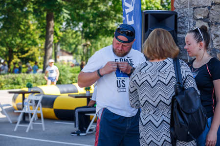 City Plavinas, Latvia. Run race, people were engaged in sports activities. Overcoming various obstacles and running.18.07.2020のeditorial素材
