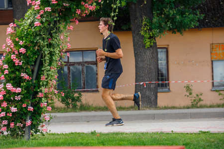 City Plavinas, Latvia. Run race, people were engaged in sports activities. Overcoming various obstacles and running.18.07.2020のeditorial素材