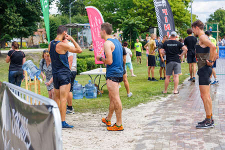 City Plavinas, Latvia. Run race, people were engaged in sports activities. Overcoming various obstacles and running.18.07.2020のeditorial素材