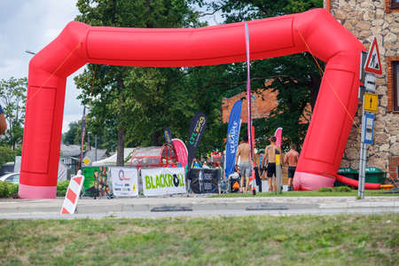 City Plavinas, Latvia. Run race, people were engaged in sports activities. Overcoming various obstacles and running.18.07.2020のeditorial素材