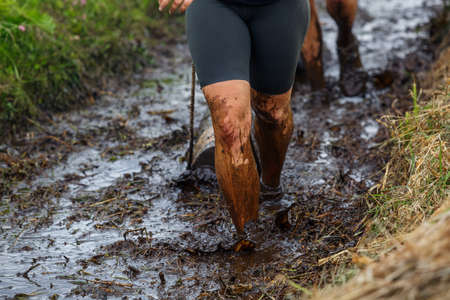 City Plavinas, Latvia. Run race, people were engaged in sports activities. Overcoming various...