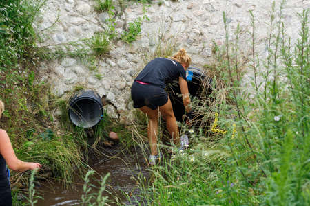 City Plavinas, Latvia. Run race, people were engaged in sports activities. Overcoming various obstacles and running.18.07.2020のeditorial素材